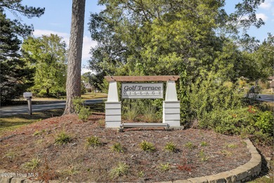 Welcome to this custom-built brick home with an open floor plan on Olde Point Golf and Country Club in North Carolina - for sale on GolfHomes.com, golf home, golf lot