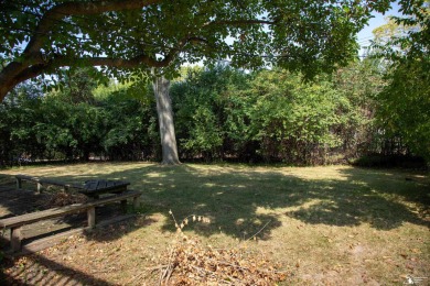 Charming Grosse Ile home situated walking distance to the water on West Shore Golf and Country Club in Michigan - for sale on GolfHomes.com, golf home, golf lot