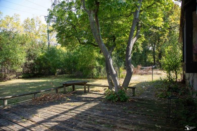 Charming Grosse Ile home situated walking distance to the water on West Shore Golf and Country Club in Michigan - for sale on GolfHomes.com, golf home, golf lot