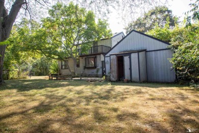 Charming Grosse Ile home situated walking distance to the water on West Shore Golf and Country Club in Michigan - for sale on GolfHomes.com, golf home, golf lot