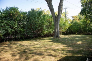Charming Grosse Ile home situated walking distance to the water on West Shore Golf and Country Club in Michigan - for sale on GolfHomes.com, golf home, golf lot
