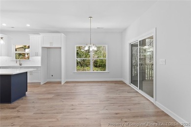 Beautiful new construction waterfront home located in the on Carolina Trace Country Club in North Carolina - for sale on GolfHomes.com, golf home, golf lot