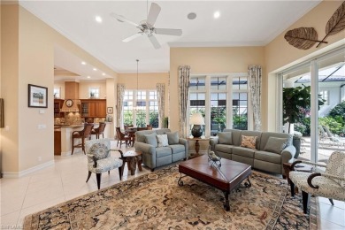 Stunning 3 BR, 3.5 BA home situated on a spectacular lakefront on Pelican Marsh Golf Club in Florida - for sale on GolfHomes.com, golf home, golf lot