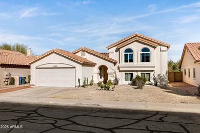 Spacious tri-level in the heart of Ahwatukee with 5 bedrooms, 3 on Ahwatukee Country Club in Arizona - for sale on GolfHomes.com, golf home, golf lot