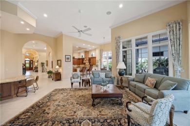 Stunning 3 BR, 3.5 BA home situated on a spectacular lakefront on Pelican Marsh Golf Club in Florida - for sale on GolfHomes.com, golf home, golf lot