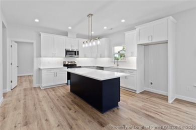 Beautiful new construction waterfront home located in the on Carolina Trace Country Club in North Carolina - for sale on GolfHomes.com, golf home, golf lot