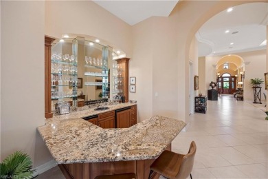 Stunning 3 BR, 3.5 BA home situated on a spectacular lakefront on Pelican Marsh Golf Club in Florida - for sale on GolfHomes.com, golf home, golf lot