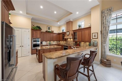 Stunning 3 BR, 3.5 BA home situated on a spectacular lakefront on Pelican Marsh Golf Club in Florida - for sale on GolfHomes.com, golf home, golf lot