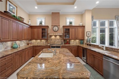 Stunning 3 BR, 3.5 BA home situated on a spectacular lakefront on Pelican Marsh Golf Club in Florida - for sale on GolfHomes.com, golf home, golf lot