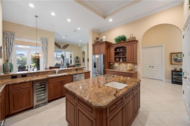 Stunning 3 BR, 3.5 BA home situated on a spectacular lakefront on Pelican Marsh Golf Club in Florida - for sale on GolfHomes.com, golf home, golf lot