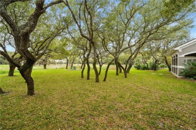 Enter through the beautifully landscaped courtyard and feel the on Rockport Country Club in Texas - for sale on GolfHomes.com, golf home, golf lot