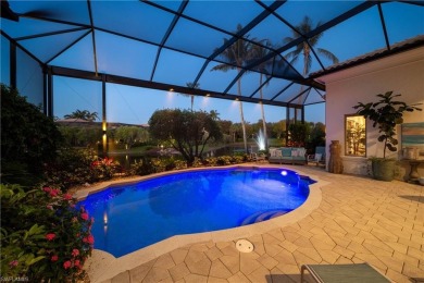 Stunning 3 BR, 3.5 BA home situated on a spectacular lakefront on Pelican Marsh Golf Club in Florida - for sale on GolfHomes.com, golf home, golf lot