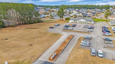 Welcome to low-maintenance coastal living at its finest! This on Palmetto Greens Golf and Country Club in South Carolina - for sale on GolfHomes.com, golf home, golf lot