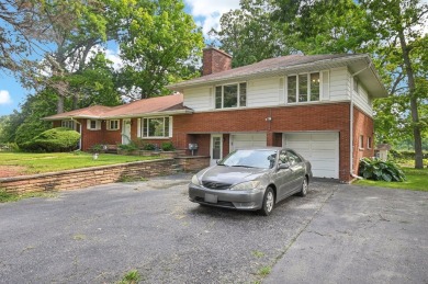 Imagine waking up every morning in a stately brick home that on Greenshire Golf Course in Illinois - for sale on GolfHomes.com, golf home, golf lot