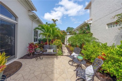Stunning 3 BR, 3.5 BA home situated on a spectacular lakefront on Pelican Marsh Golf Club in Florida - for sale on GolfHomes.com, golf home, golf lot
