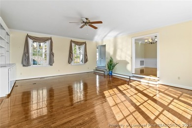 Stunning lakefront living awaits at 253 Lakeview Dr in the on Carolina Trace Country Club in North Carolina - for sale on GolfHomes.com, golf home, golf lot