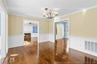 Stunning lakefront living awaits at 253 Lakeview Dr in the on Carolina Trace Country Club in North Carolina - for sale on GolfHomes.com, golf home, golf lot