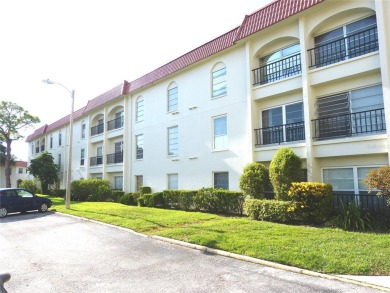 Location, location! Ground floor unit right by the pool & rec on The Dunedin Country Club in Florida - for sale on GolfHomes.com, golf home, golf lot