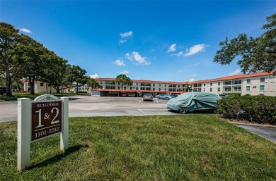 Location, location! Ground floor unit right by the pool & rec on The Dunedin Country Club in Florida - for sale on GolfHomes.com, golf home, golf lot