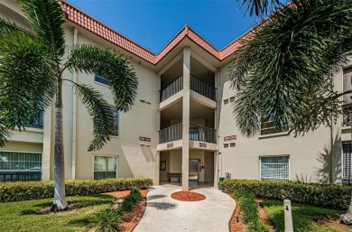 Location, location! Ground floor unit right by the pool & rec on The Dunedin Country Club in Florida - for sale on GolfHomes.com, golf home, golf lot