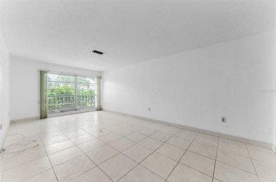 Location, location! Ground floor unit right by the pool & rec on The Dunedin Country Club in Florida - for sale on GolfHomes.com, golf home, golf lot