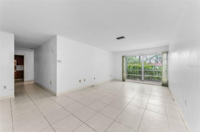 Location, location! Ground floor unit right by the pool & rec on The Dunedin Country Club in Florida - for sale on GolfHomes.com, golf home, golf lot