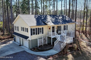 Tucked away on a cul-de-sac in the sought-after Fairfield on Harbour Point Golf Club in North Carolina - for sale on GolfHomes.com, golf home, golf lot