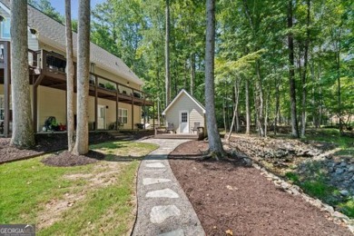 Charming Lakeside Retreat Just Steps from the Water! Welcome to on The Highlands Course at Lake Arrowhead in Georgia - for sale on GolfHomes.com, golf home, golf lot