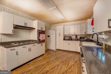 A rare find in Turtle Cove - double lot with only one amenity on Turtle Cove Golf Course in Georgia - for sale on GolfHomes.com, golf home, golf lot