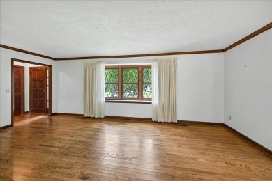 Incredible Tudor-style home on a full acre overlooking the newly on Killearn Country Club and Inn in Florida - for sale on GolfHomes.com, golf home, golf lot