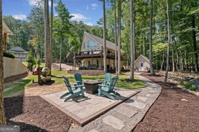 Charming Lakeside Retreat Just Steps from the Water! Welcome to on The Highlands Course at Lake Arrowhead in Georgia - for sale on GolfHomes.com, golf home, golf lot