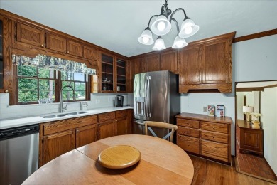 Incredible Tudor-style home on a full acre overlooking the newly on Killearn Country Club and Inn in Florida - for sale on GolfHomes.com, golf home, golf lot