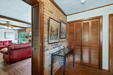 Incredible Tudor-style home on a full acre overlooking the newly on Killearn Country Club and Inn in Florida - for sale on GolfHomes.com, golf home, golf lot