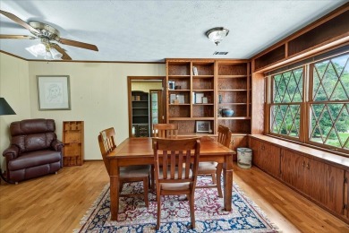 Incredible Tudor-style home on a full acre overlooking the newly on Killearn Country Club and Inn in Florida - for sale on GolfHomes.com, golf home, golf lot