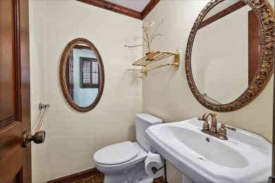 Incredible Tudor-style home on a full acre overlooking the newly on Killearn Country Club and Inn in Florida - for sale on GolfHomes.com, golf home, golf lot