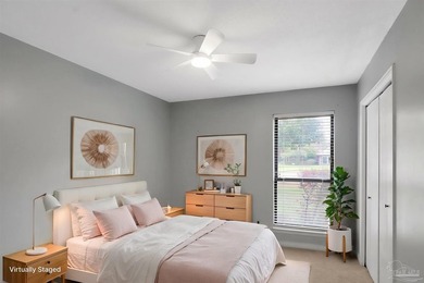 Located in the heart of Tiger Point, this 4-bedroom, 2-bath home on Tiger Point Golf and Country Club in Florida - for sale on GolfHomes.com, golf home, golf lot