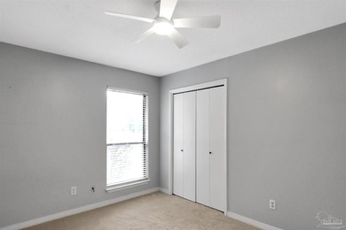 Located in the heart of Tiger Point, this 4-bedroom, 2-bath home on Tiger Point Golf and Country Club in Florida - for sale on GolfHomes.com, golf home, golf lot