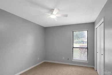 Located in the heart of Tiger Point, this 4-bedroom, 2-bath home on Tiger Point Golf and Country Club in Florida - for sale on GolfHomes.com, golf home, golf lot