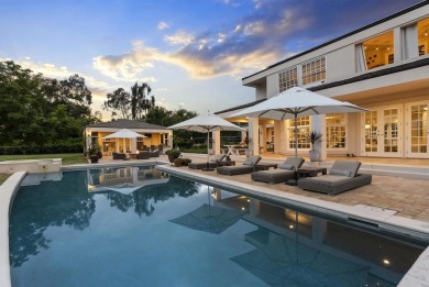 Behind private gates in the heart of the Rancho Santa Fe on Rancho Santa Fe Golf Club in California - for sale on GolfHomes.com, golf home, golf lot