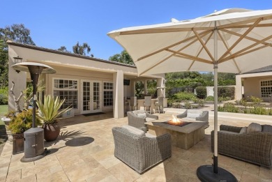 Behind private gates in the heart of the Rancho Santa Fe on Rancho Santa Fe Golf Club in California - for sale on GolfHomes.com, golf home, golf lot