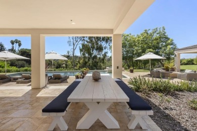 Behind private gates in the heart of the Rancho Santa Fe on Rancho Santa Fe Golf Club in California - for sale on GolfHomes.com, golf home, golf lot
