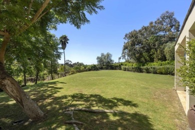 Behind private gates in the heart of the Rancho Santa Fe on Rancho Santa Fe Golf Club in California - for sale on GolfHomes.com, golf home, golf lot