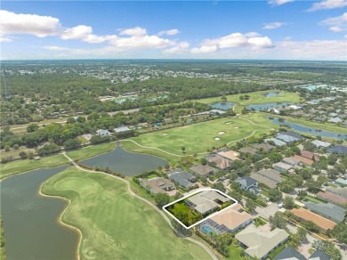 This home is nestled on the 3rd hole of the Pointe West golf on The Club At Pointe West in Florida - for sale on GolfHomes.com, golf home, golf lot