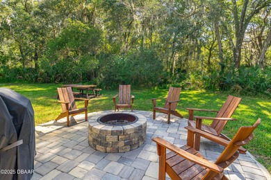 Stunning Halifax Plantation golf course custom pool home on a on Halifax Plantation Golf Club in Florida - for sale on GolfHomes.com, golf home, golf lot