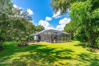 Stunning Halifax Plantation golf course custom pool home on a on Halifax Plantation Golf Club in Florida - for sale on GolfHomes.com, golf home, golf lot