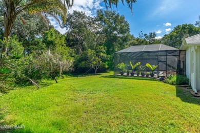 Stunning Halifax Plantation golf course custom pool home on a on Halifax Plantation Golf Club in Florida - for sale on GolfHomes.com, golf home, golf lot