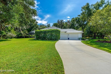 Stunning Halifax Plantation golf course custom pool home on a on Halifax Plantation Golf Club in Florida - for sale on GolfHomes.com, golf home, golf lot