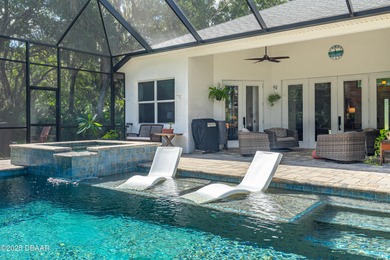 Stunning Halifax Plantation golf course custom pool home on a on Halifax Plantation Golf Club in Florida - for sale on GolfHomes.com, golf home, golf lot