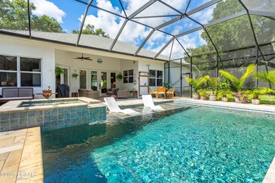 Stunning Halifax Plantation golf course custom pool home on a on Halifax Plantation Golf Club in Florida - for sale on GolfHomes.com, golf home, golf lot