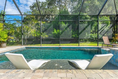 Stunning Halifax Plantation golf course custom pool home on a on Halifax Plantation Golf Club in Florida - for sale on GolfHomes.com, golf home, golf lot